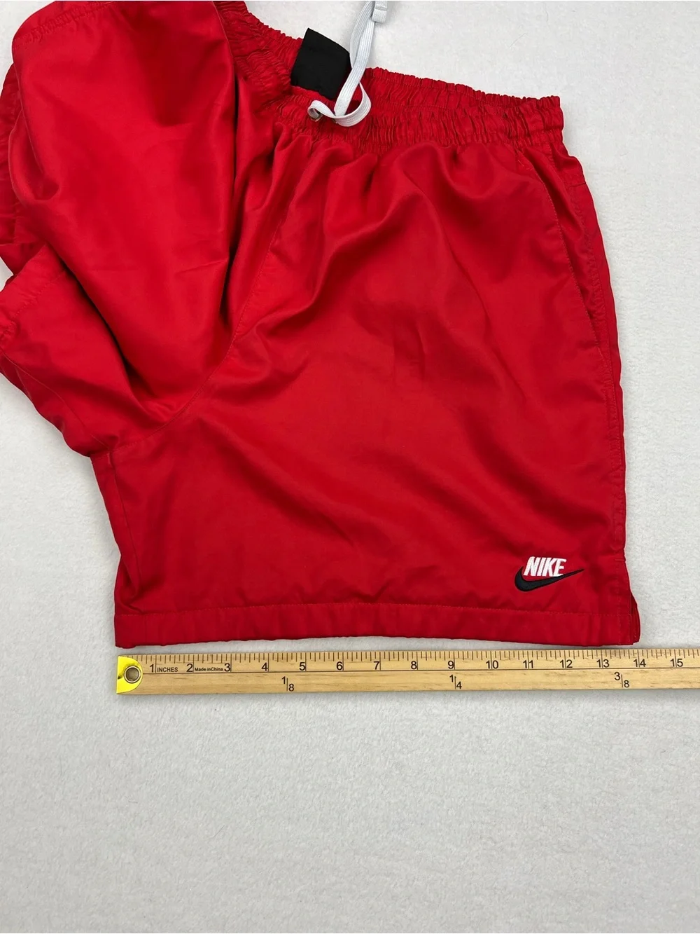 Nike side red pockets